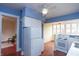 Bright kitchen featuring modern appliances, white cabinets and hardware, and a ceiling fan at 5915 Lowell Ave, Indianapolis, IN 46219