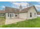Backyard featuring a covered patio, well-kept lawn, and access to the home at 607 N White Ash N Ct, Mooresville, IN 46158