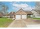 Beautiful brick home with an attached two-car garage, providing a functional blend of style and convenience at 607 N White Ash N Ct, Mooresville, IN 46158