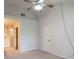 Spacious main bedroom with neutral carpet, high ceilings, ceiling fan, and ensuite bathroom at 607 N White Ash N Ct, Mooresville, IN 46158