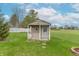 Charming backyard shed providing extra storage with a well-kept lawn at 607 N White Ash N Ct, Mooresville, IN 46158