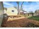 Inviting backyard with a wooden deck and a charming fire pit for outdoor enjoyment at 621 Melvenia St, Indianapolis, IN 46219