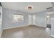 Bright and airy living room with neutral paint, modern flooring, and natural light at 621 Melvenia St, Indianapolis, IN 46219
