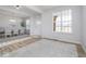 Foyer and dining area featuring luxury vinyl plank flooring and lots of natural light at 6609 N Dogwood Dr, McCordsville, IN 46055