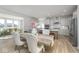 Open-concept kitchen and dining area with modern appliances, ample counter space, and stylish décor at 6609 N Dogwood Dr, McCordsville, IN 46055