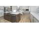 Contemporary kitchen showcasing a large sink, stainless steel appliances, and open layout at 6609 N Dogwood Dr, McCordsville, IN 46055