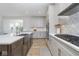 Bright kitchen featuring stainless steel appliances, a center island, and an open layout at 6609 N Dogwood Dr, McCordsville, IN 46055