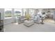 Light-filled living room and kitchen with cozy sectional sofa and stylish furnishings at 6609 N Dogwood Dr, McCordsville, IN 46055