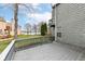 Backyard featuring a deck/patio, mature landscaping and gray siding with distant water view at 7160 Harbour, Indianapolis, IN 46240