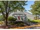 Charming home exterior featuring a private entrance and well-maintained landscaping at 7160 Harbour, Indianapolis, IN 46240