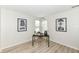 This office features luxury vinyl flooring and natural light from two windows at 7160 Harbour, Indianapolis, IN 46240