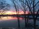 Beautiful water view showing sunset over the lake at 7160 Harbour, Indianapolis, IN 46240