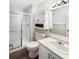 Well-maintained bathroom with glass shower, white vanity, and modern fixtures at 7228 Muirfield Pl, Indianapolis, IN 46237