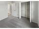 Bedroom with a closet and neutral carpet, offering a serene and inviting space at 7228 Muirfield Pl, Indianapolis, IN 46237