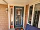 Welcoming front door with decorative glass and sidelights, creating an inviting entrance at , Indianapolis, IN 46217