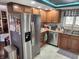 Spacious kitchen with stainless steel appliances, wood cabinets and light countertops at , Indianapolis, IN 46217