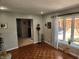 Bright living room features hardwood floors, large window to backyard, and neutral paint at , Indianapolis, IN 46217
