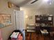 Cozy office features a vintage desk, hardwood floors and a world map for planning your next vacation at , Indianapolis, IN 46217