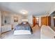 Spacious bedroom featuring a queen-sized bed, dresser, and modern lighting at 802 Burwick Trce, Greenwood, IN 46143