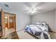 Cozy bedroom features carpet and blue and white quilt at 802 Burwick Trce, Greenwood, IN 46143