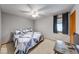 Bedroom featuring a queen bed, dark curtains and a corner table at 802 Burwick Trce, Greenwood, IN 46143