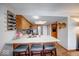 Charming kitchen featuring a breakfast bar, updated appliances and ample cabinet storage space at 802 Burwick Trce, Greenwood, IN 46143
