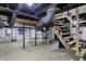 Unfinished basement with exposed ductwork and utilities, offering potential for customization at 934 E Minnesota St, Indianapolis, IN 46203