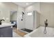 Modern bathroom with a walk-in shower, soaking tub, and double vanity at 934 E Minnesota St, Indianapolis, IN 46203