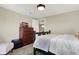 Cozy bedroom featuring neutral walls, plush carpet, and modern furnishings at 934 E Minnesota St, Indianapolis, IN 46203
