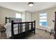 Cozy bedroom featuring neutral walls, plush carpet, and modern furnishings at 934 E Minnesota St, Indianapolis, IN 46203