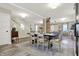 Dining area boasts a modern table, stylish chairs, and decorative rug creating an inviting space at 934 E Minnesota St, Indianapolis, IN 46203