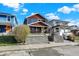 Well-maintained home exterior with charming front porch and lush landscaping at 934 E Minnesota St, Indianapolis, IN 46203