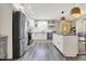 Bright kitchen with white cabinets, stainless steel appliances, and center island at 934 E Minnesota St, Indianapolis, IN 46203