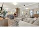 Spacious living room with open layout, comfortable seating, and exposed brickwork, creating a cozy gathering space at 934 E Minnesota St, Indianapolis, IN 46203
