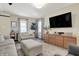 Spacious living room with comfortable seating, stylish decor, and an open floor plan providing a welcoming atmosphere at 934 E Minnesota St, Indianapolis, IN 46203