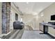 Open loft space with exposed brick, modern furnishings, and neutral decor at 934 E Minnesota St, Indianapolis, IN 46203