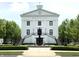 Exterior view of a large historical looking building with a clock tower at 12652 Meeting House Rd, Carmel, IN 46032