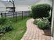 Well-manicured lawn and garden area, with a white picket fence lining the property at 12652 Meeting House Rd, Carmel, IN 46032