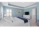 Relaxing bedroom with tray ceiling, soft lighting and access to ensuite bathroom at 13783 Tender Dr, Carmel, IN 46032