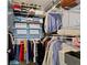Closet featuring wire rack shelving and clothing hanging on hangers at 13783 Tender Dr, Carmel, IN 46032
