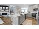 Kitchen featuring white quartz countertops, shaker cabinets, and stainless appliances at 13783 Tender Dr, Carmel, IN 46032