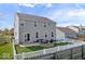 Exterior view of the back of the home with a patio and fenced yard at 15152 Fallen Leaves Ln, Noblesville, IN 46060