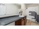 Clean bathroom showcasing a vanity with ample counter space and dinosaur themed shower curtain at 15152 Fallen Leaves Ln, Noblesville, IN 46060