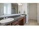 Well-lit bathroom showcasing a double vanity with modern fixtures and ample counter space at 15152 Fallen Leaves Ln, Noblesville, IN 46060