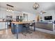 Modern kitchen featuring stainless steel appliances, an island, and an open layout at 15152 Fallen Leaves Ln, Noblesville, IN 46060