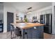 Updated kitchen boasting a large island, stainless appliances, and modern finishes at 15152 Fallen Leaves Ln, Noblesville, IN 46060