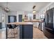 Renovated kitchen featuring stainless appliances, large island, and stylish finishes at 15152 Fallen Leaves Ln, Noblesville, IN 46060