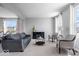 Bright living room filled with natural light, comfortable seating, and neutral decor at 15152 Fallen Leaves Ln, Noblesville, IN 46060