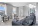 Inviting living room features neutral paint and carpet, and lots of natural light at 15152 Fallen Leaves Ln, Noblesville, IN 46060