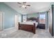 Cozy main bedroom with modern furnishings, soft lighting, and barn door accent at 15152 Fallen Leaves Ln, Noblesville, IN 46060